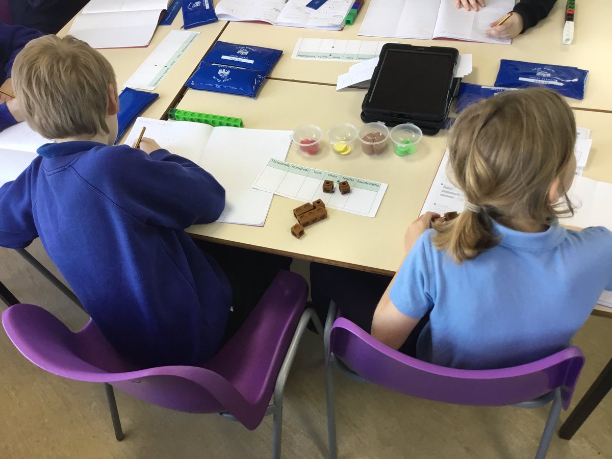 LeysFarm's tweet photo. Class 4W using their resources to help them round one place decimals to the nearest integer in Maths today. #LFJSMaths #LFJSCPA @WhiteRoseEd https://t.co/mSRvkGLyPv