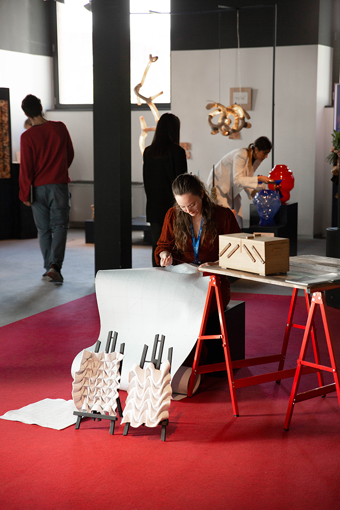 Milan Design Week
Isola Design reports by <a href="/wisse_design/">Wisse Design</a>

Naomi Remijn presents her new light object from her 0118 collection at the Tools &amp; Crafts exhibition at Isola. Her handmade work is inspired by the Zeeland traditional costume. 
Photos by Bracket Studio