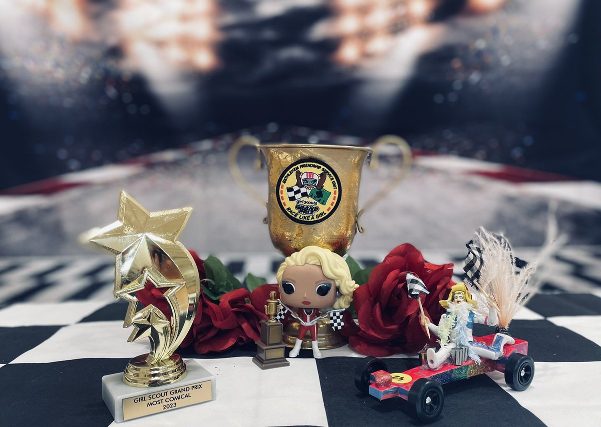 Jen_S_Thornton's tweet photo. @RuPaulsDragRace My child (she/they/them) made a very special car for their Girl Scout’s pine wood derby: “The Drag Racer”.  I made a special photo op for all the cars at the derby.  @RuPaul @girlscouts https://t.co/ytJ7BddtJ5