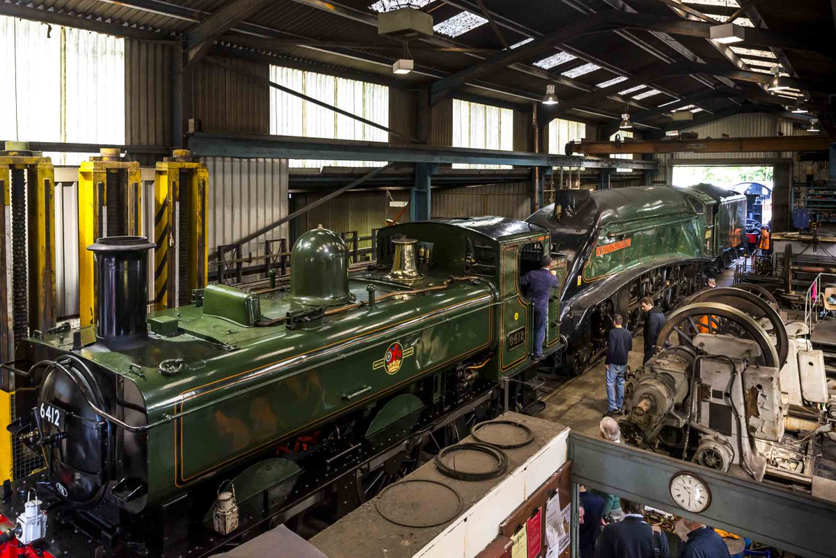 southdevonrly's tweet photo. For #ThrowbackThursday we're back in August 2015. #LNER A4 Union of South Africa developed a hot box on the mainline and came to the #SDR for repairs - the first A4 ever on the line. Here she is in the #SDRE workshops with our #GWR pannier 6412 #Steam #Railways #Devon #VisitDevon https://t.co/MzVExR8Zz6