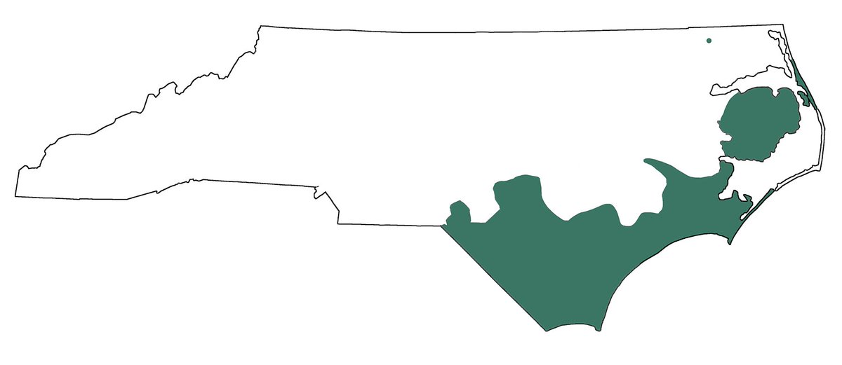 The green area is where alligators can be found in North Carolina. 

In other words...the further you go into the green area, the higher probability of one seeing you later.