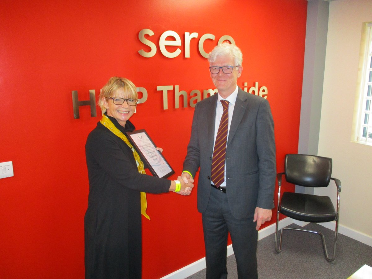 PRG_UK's tweet photo. PRG volunteers Maggie Gallagher &amp; Graham Coster being presented with Certificates of Special Recognition from @ButlerTrust  for their wonderful work over many years with the reading groups at HMP Thameside. Many thanks also to @neil_barclay and the library. #VolunteerDay https://t.co/ECaJDUrYYS