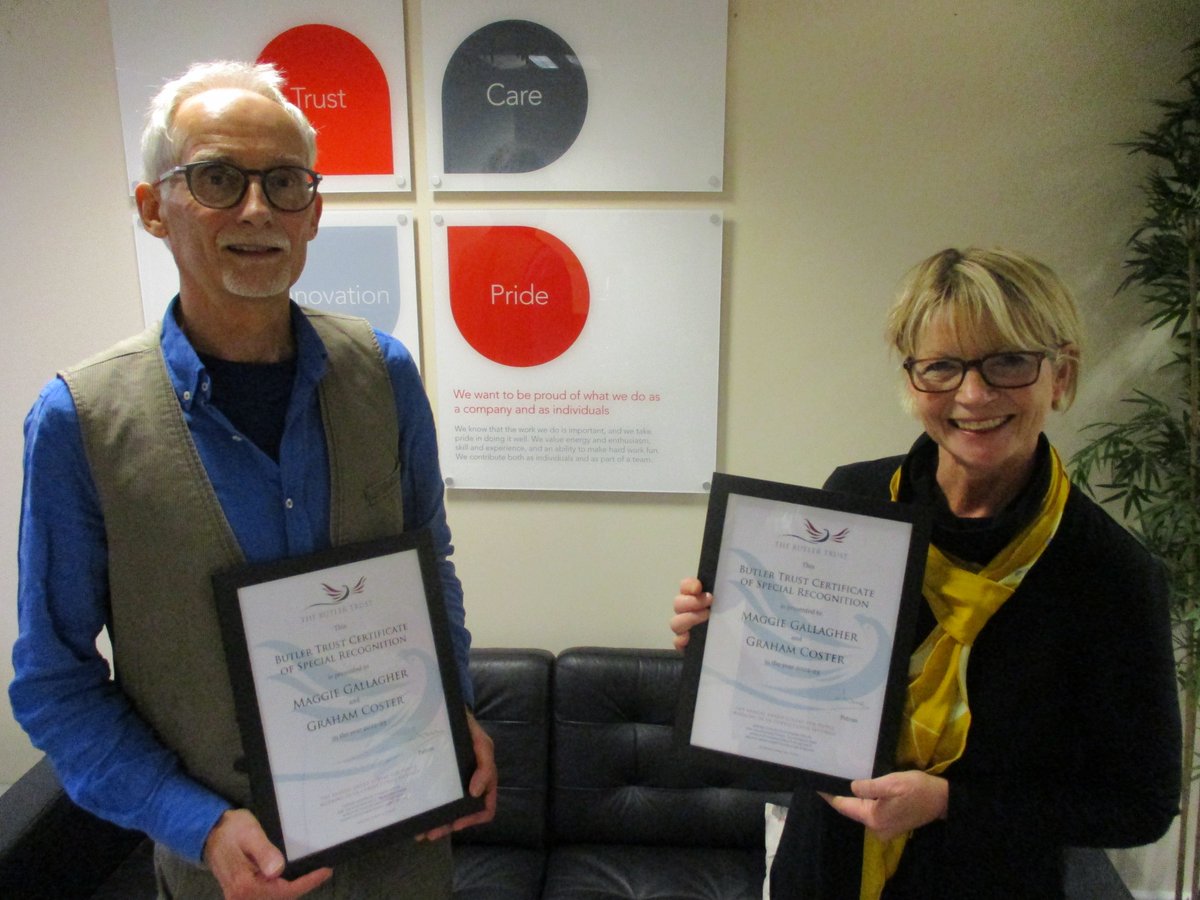 PRG_UK's tweet photo. PRG volunteers Maggie Gallagher &amp; Graham Coster being presented with Certificates of Special Recognition from @ButlerTrust  for their wonderful work over many years with the reading groups at HMP Thameside. Many thanks also to @neil_barclay and the library. #VolunteerDay https://t.co/ECaJDUrYYS