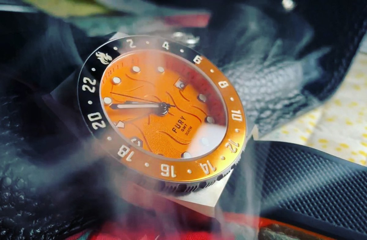 WatchWitt's tweet photo. Smokin' Hot! It's a thick one, but much lighter in titanium! The Fury GMT with Seiko NH34 automatic movement. https://t.co/xoO2utgwe9 https://t.co/wdhiV8Pdrp