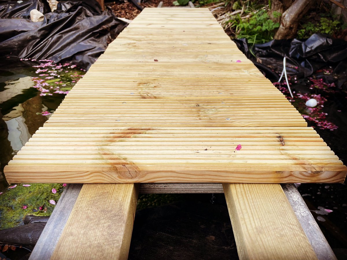 Ant_vegan_'s tweet photo. Building bridge. Decking & boulders to position around pond, now the weather is nicer. #naturalpool #swimpond #bogfilter https://t.co/LBAnD2hT66