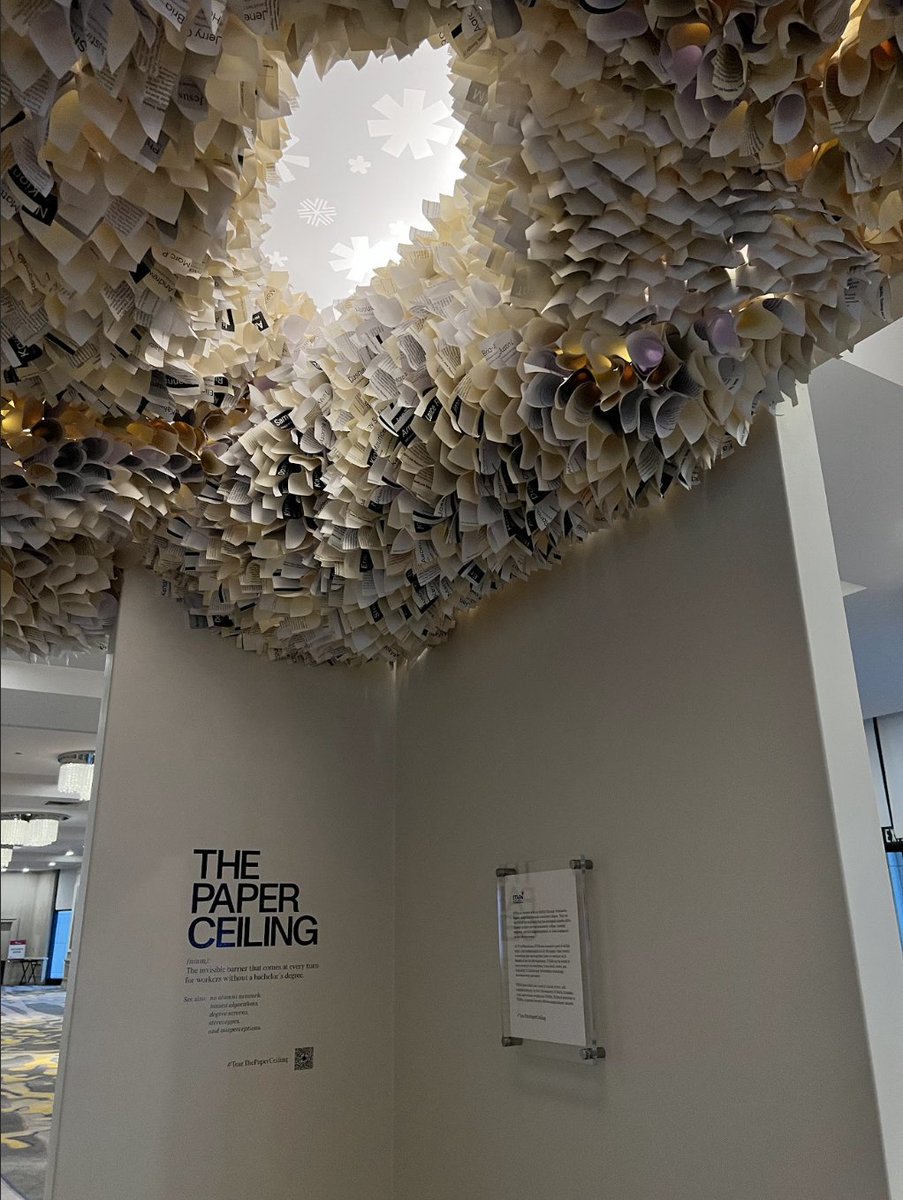 stradaeducation's tweet photo. We're proud to support this stunning manifestation of #ThePaperCeiling, an invisible barrier that comes at every turn for workers without a bachelor’s degree which debuted at #asugsvsummit today! At Strada, we’re committed to #TearThePaperCeiling to #HireSTARs. https://t.co/J5msrVoxh0
