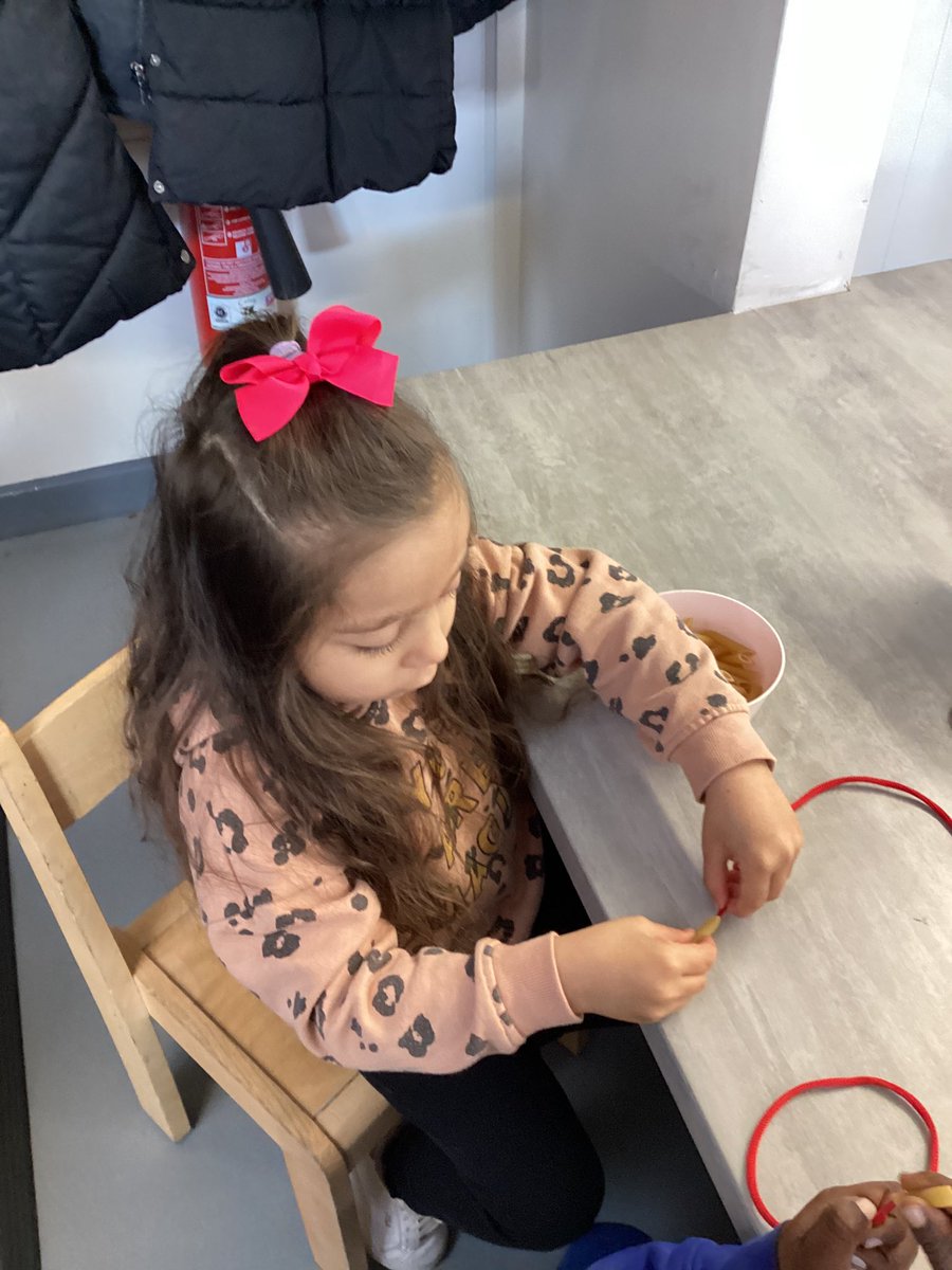 Nurserystm1's tweet photo. Using our fine motor skills to make pasta necklaces. #STMeyfs #STMphysicaldevelopment https://t.co/fsg8qcMbQh