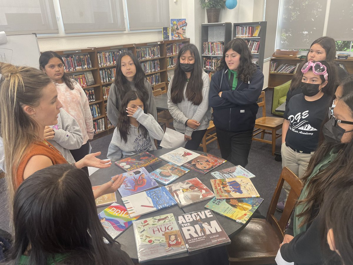 Muir library supports school literacy by curating books for our Diversity Club. These MS students celebrate our school by going into classrooms and reading books to elementary students - highlighting our diverse community #PowerofTLs @LongbeachUSD @MSK8LBUSD