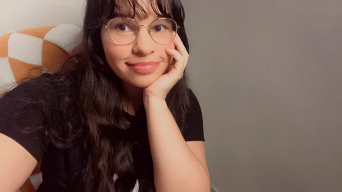 Selfie of Yuri looking straight into the camera at the company that will hire her 