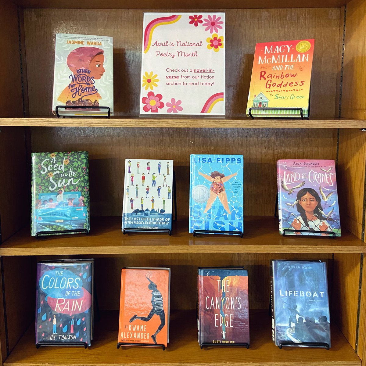 Highlighting some of our amazing fiction novels-in-verse near the circulation desk for National Poetry Month! @BCPSLMP #AASLslm