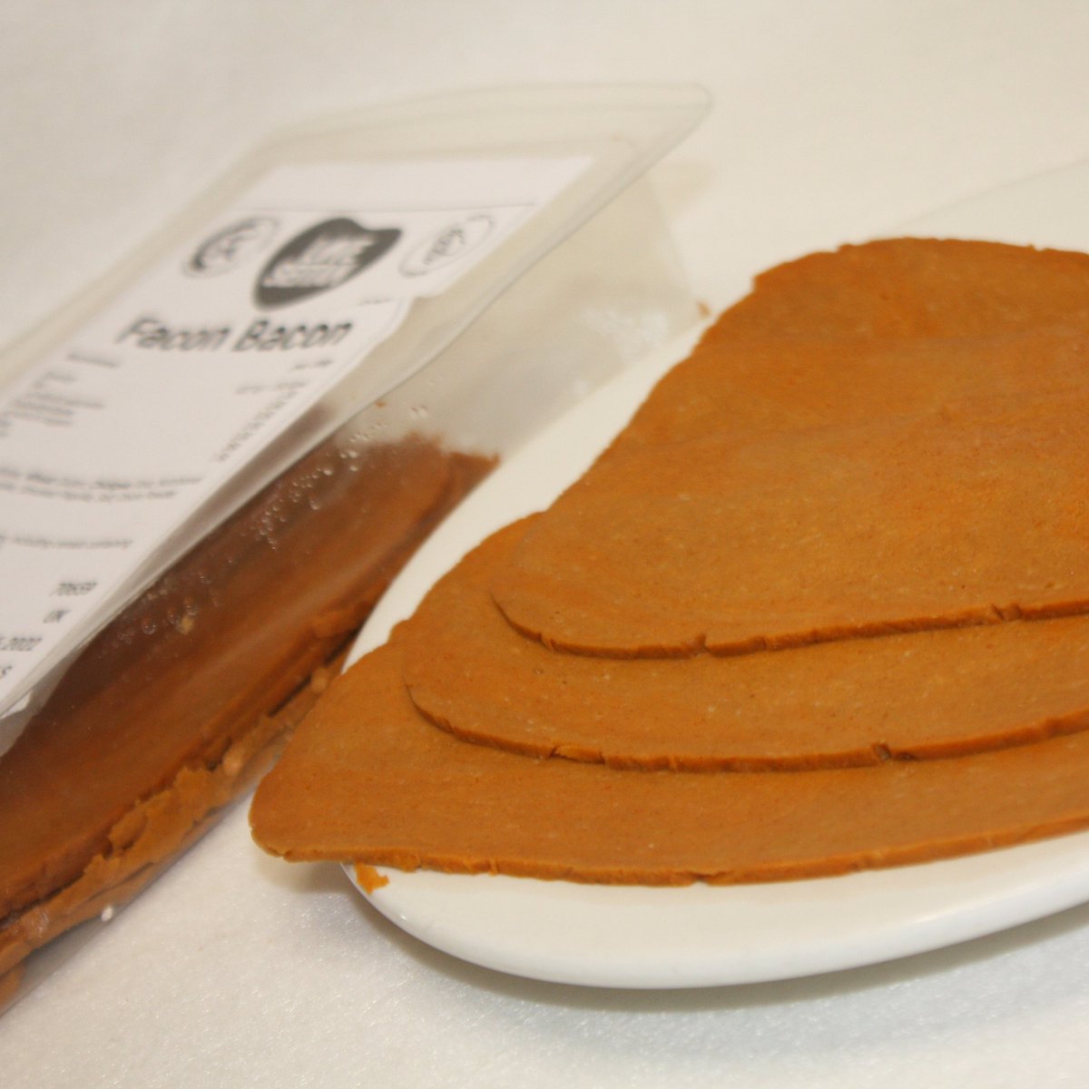 Reminder that our 500g packs of facon bacon are 30% off at the moment on our website 🥓🥓

We also have 30% off seitan pepperoni and 20% off seitan bites 🌱

Check out our SOS (Seitan Outlet Store) and grab a bargain ❤️