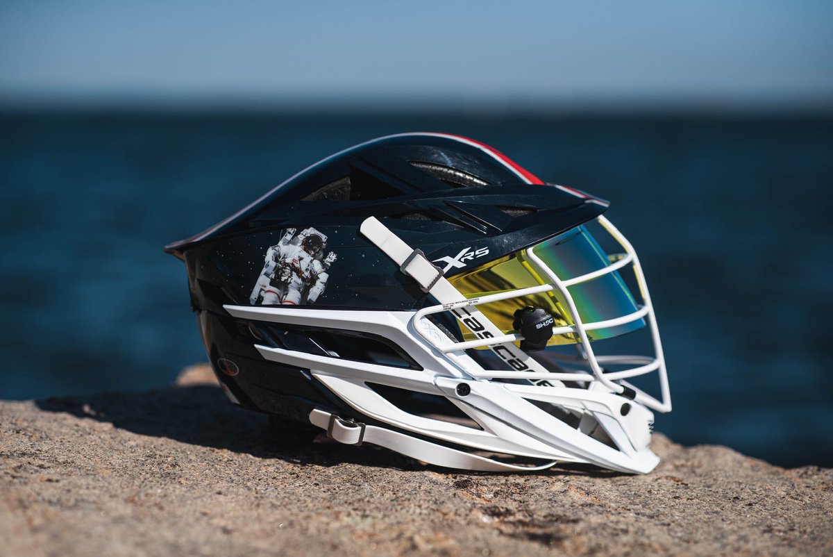 NavyMLax's tweet photo. A closer look at our helmets for Saturday! 

54 astronauts are Naval Academy graduates the most of any institution including Navy Lacrosse alum CAPT, USN Ret. Robert Curbeam

#BL40
#GoNavy⚓️🇺🇸 https://t.co/WwZYYKScc1