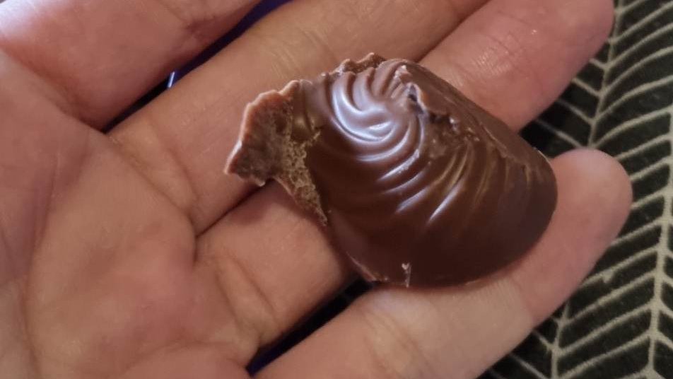 beccafee's tweet photo. @CadburyUK 
Was gifted some milk tray yesterday from a lovely student nurse. Opened them today to find these squished melted messes 🥺
#devastating 
#howdiditpassQC
#pregnantandchocolatestarved https://t.co/cYBqrUJaQ9