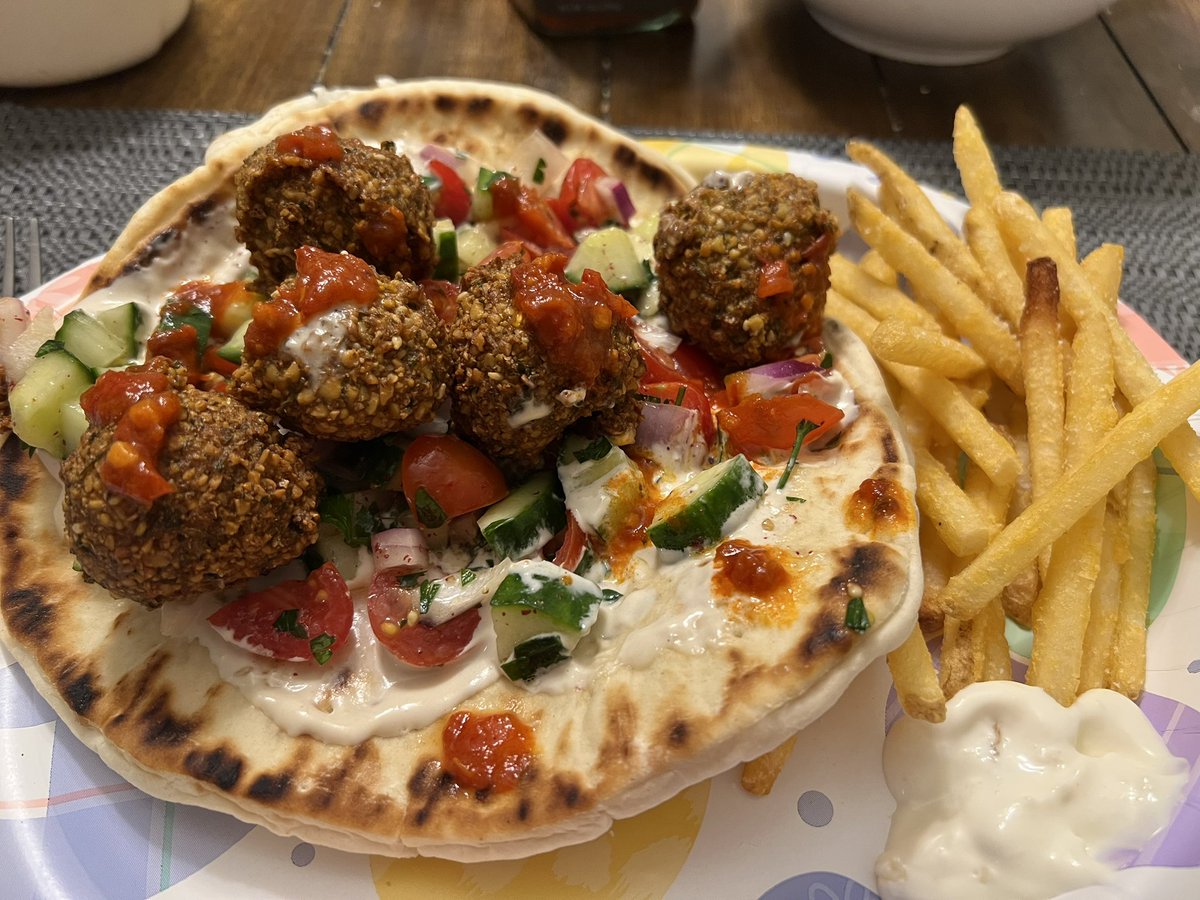 NJGrrrl's tweet photo. @altonbrown Homemade falafel, pita and fries with shepherd salad, harissa and a tahini drizzle. https://t.co/TN5XyPYx0b