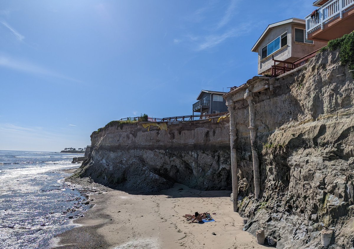 DocHarleyMD's tweet photo. Why teach theoretical coastal erosion when it is directly on display at the UC Santa Barbara campus. Not sure those students are sunbaking in the best spot! https://t.co/vZi2iAc0C2