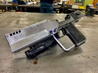 I guess we got that magnum pistol from the Halo Series sent in.

No real information on it, I'm assuming it's something that actually works

 No this isn't for sale, a threat or anything of that nature

Check for FB link