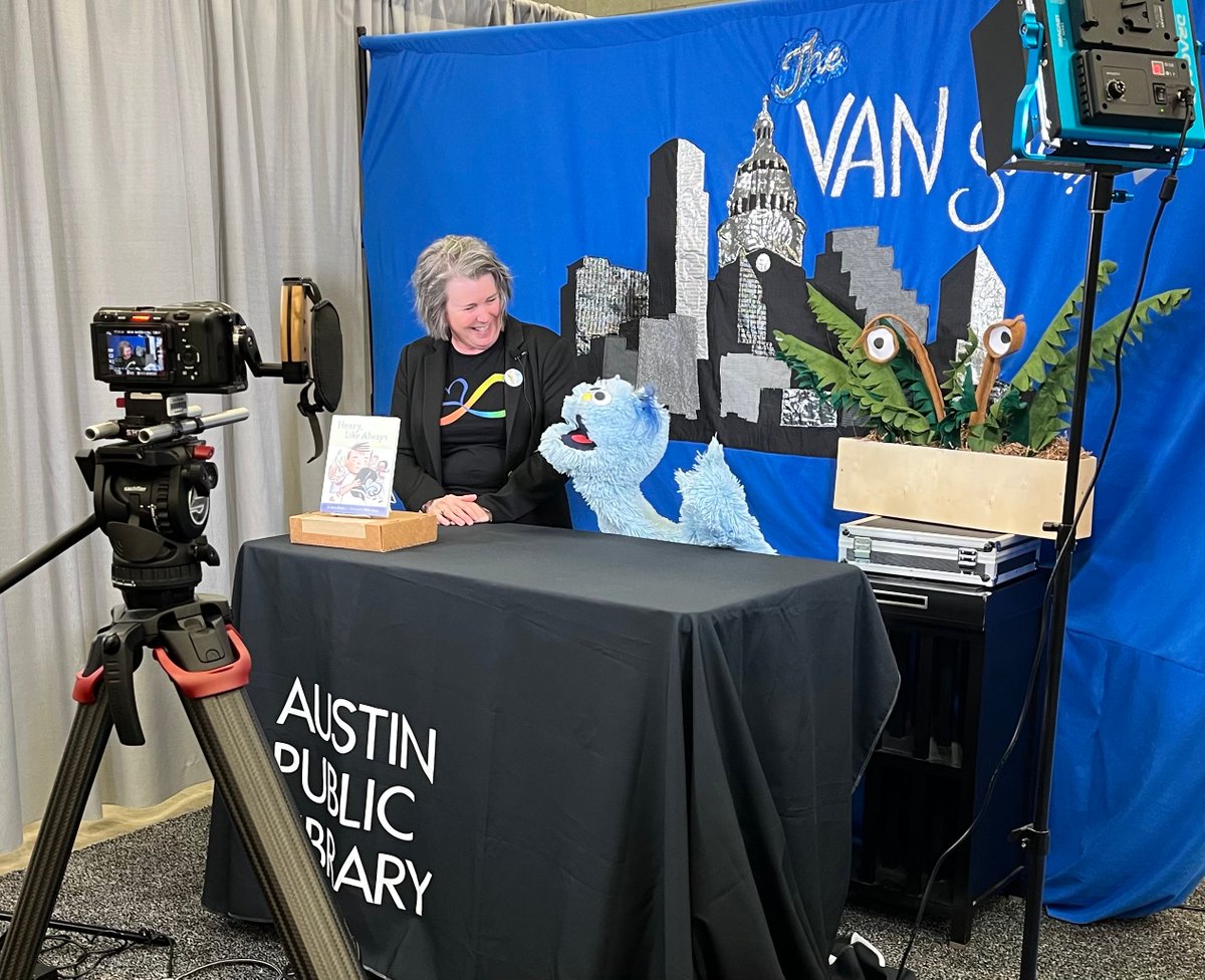 JennBailey's tweet photo. Why do I love my job? THIS! This is why! Chatting Art and Story with @AustinPublicLib 's Wonderful VAN! #txla23 #kidlit #HenryLikeAlways #autismacceptance @chroniclekids https://t.co/sPdvVuFq6h