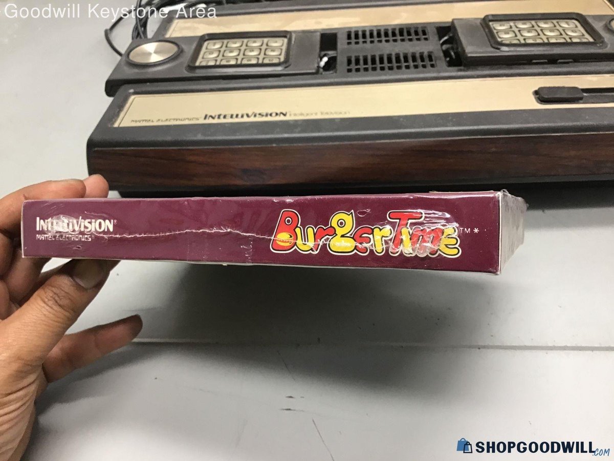 GoodwillGoblin's tweet photo. a sealed copy of BurgerTime for the Intellivision, complete with KB Toys markdown sticker, has appeared on Shop Goodwill https://t.co/zNgCpPblI1