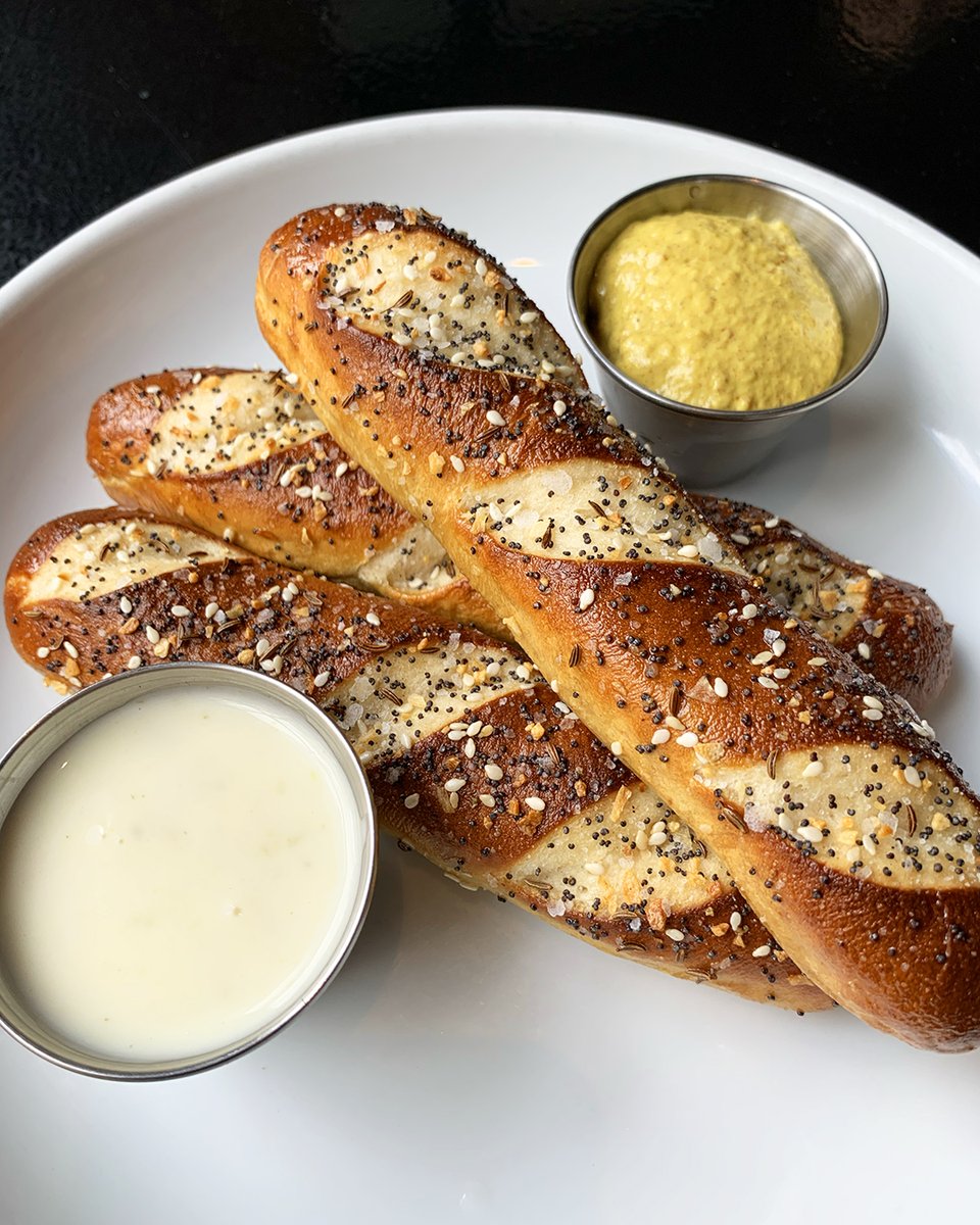Never underestimate the power of a good beer cheese dip and spicy mustard. Pair them with pretzels, and you've got everything you need.