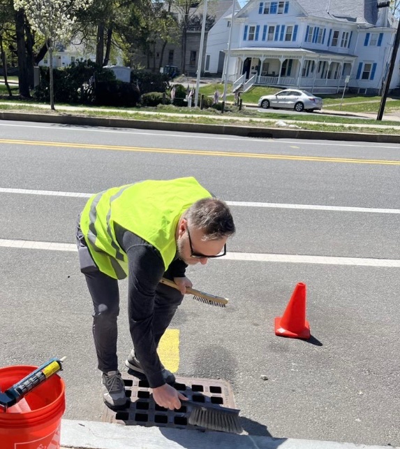 JacqueGoddard's tweet photo. MassDOT employees join @MassGovernor Healey Admin to enc “best practices” #MAEarthWeek - “No dumping, drains to waterway” medallions placed #Stoughton roads https://t.co/W9bnJcOz4o
