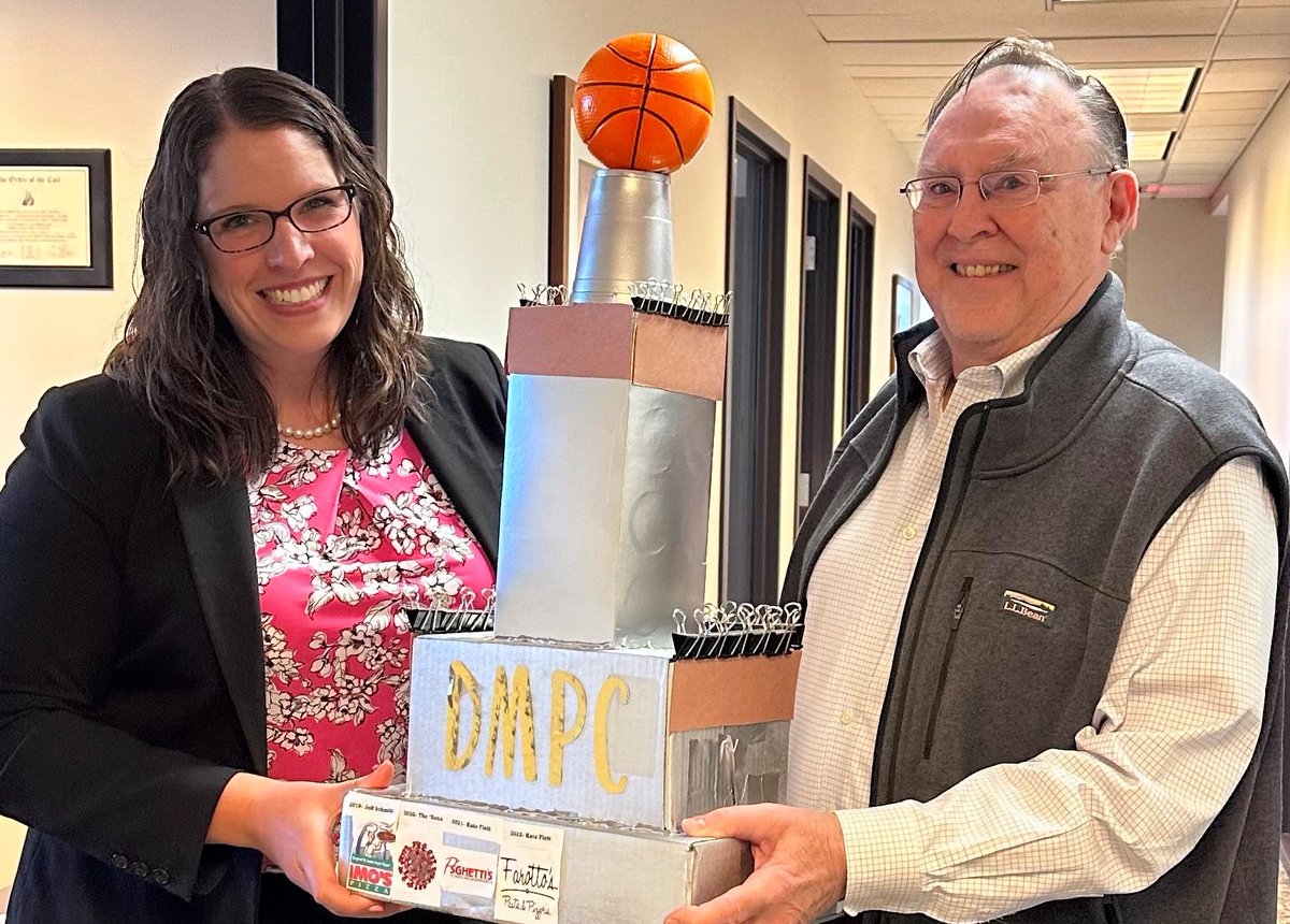 KateFlett22's tweet photo. Mike McKitrick is Danna McKitrick's #2023MarchMadness winner! Katherine Flett, the winner in 2021 and 2022, passed the trophy to Mike. Mike now gets to select his favorite pizza for a pizza party for the firm! Congrats, Mike! https://t.co/G11keFqH8S