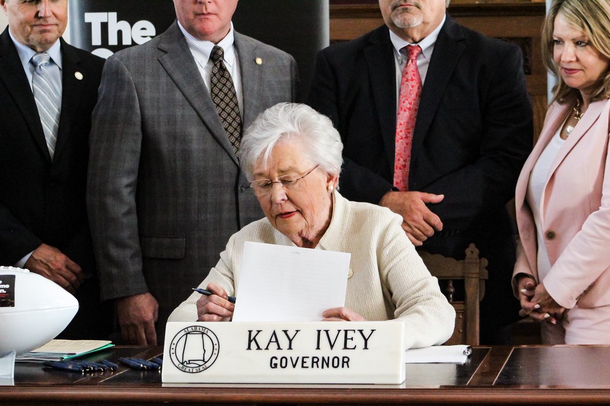 sarahgswetlik's tweet photo. Also today – Gov. Ivey signed & law and a football.
(Yes, there’s more to it than that — story by @MikeCasonAL below)
#alpolitics #alfootball-itics ?
https://t.co/AGottaqXqO https://t.co/ZwR4Axfj7W