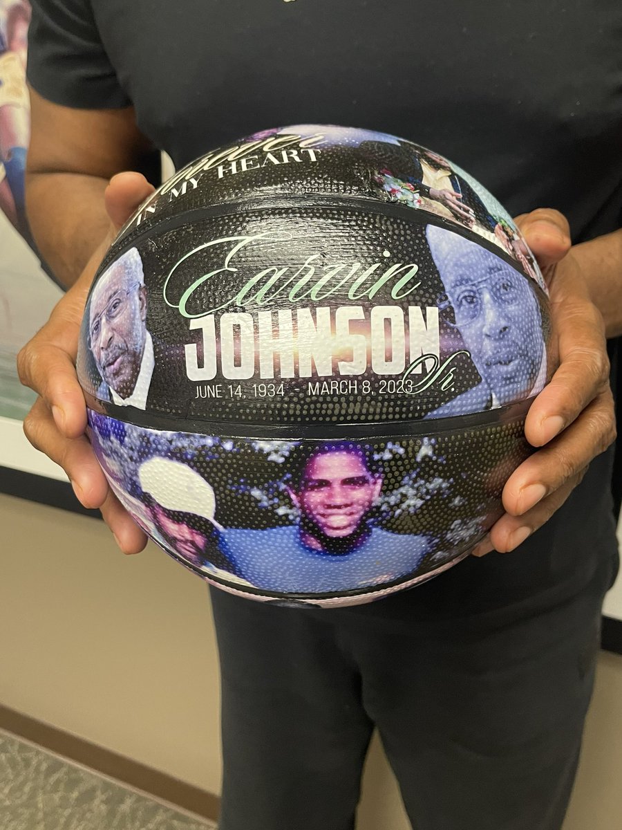 MagicJohnson's tweet photo. I want to send a special thank you to artist Brittany Baham for creating this incredible basketball in memory of my father! 💚🤍 @BahamMultimedia https://t.co/VtH1ZqRmx8