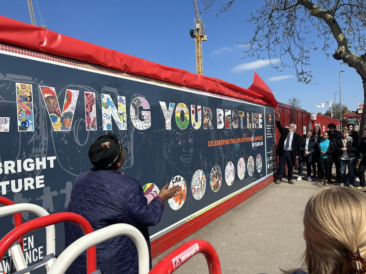 sandrabauer's tweet photo. So proud to be at the unveiling of this gorgeous artwork in my ward. It’ll be on show whilst the building work continues. 

It’s a great celebration of Stephen Lawrence’s legacy. 

 @averil_lekau @creativetallis #GreenwichBuilds @HTADesignLLP @Royal_Greenwich 
#SLD30 @CliveEfford https://t.co/bI1ouiA3Le