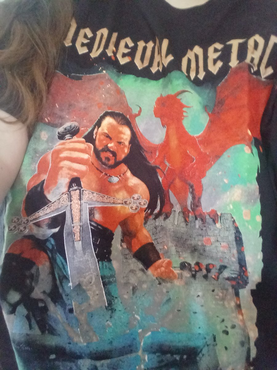 Meghan_Wooden's tweet photo. It's a #drewday yes it is!  Enjoying my new @DMcIntyreWWE shirt.  I miss seeing (my bestie he just doesn't know it yet) on tv.  Come back soon!  #DrewMcintyreDeservesBetter https://t.co/vhpy0dqw64