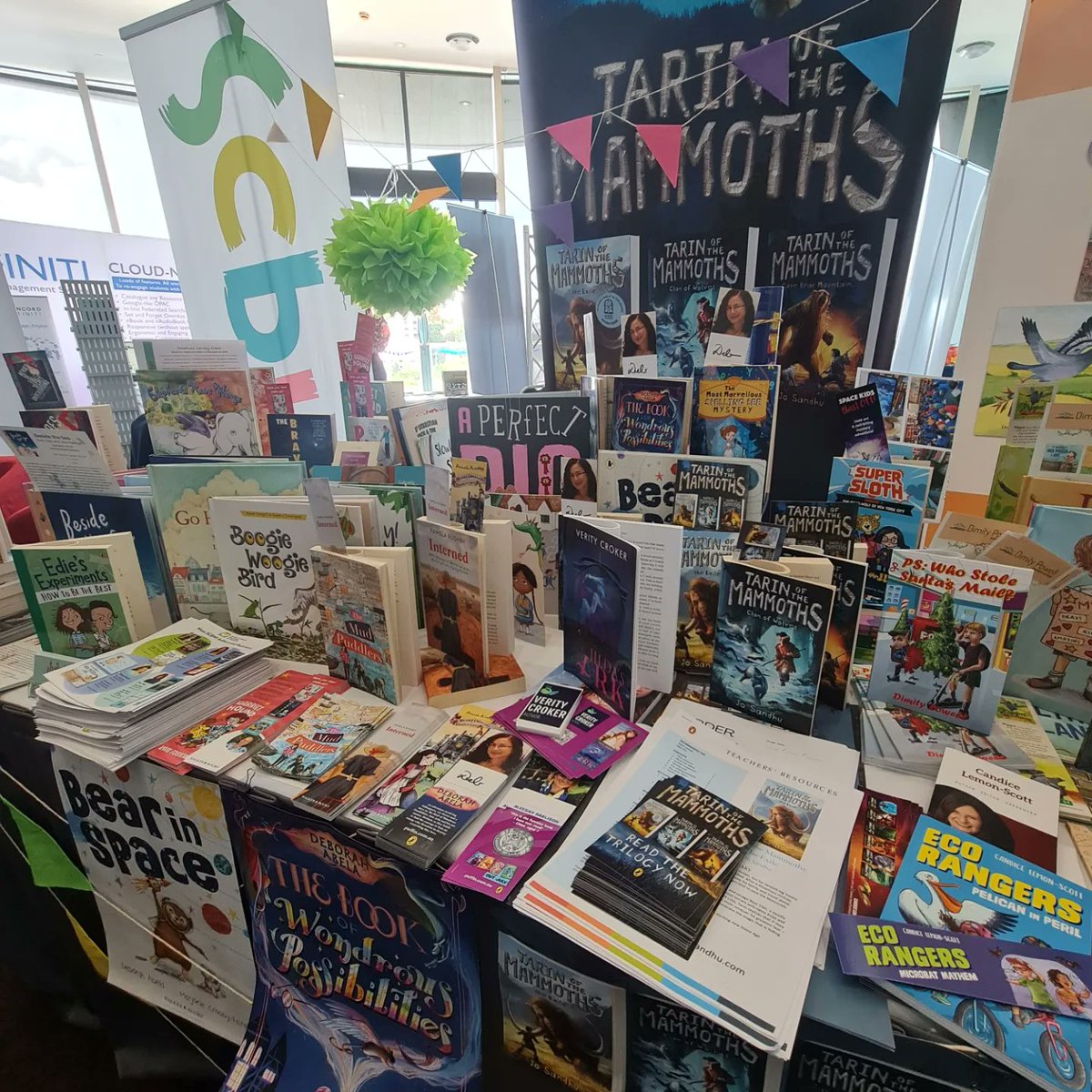 How vibrant is the @scbwiaustralia stand at #Asla2023 @aslanational ?? Today the #authors & #illustrators were on hand to chat about books, reading, & our love of #kidlit.

#loveozkidlit #picture books #middlegrade #childrensliteracy #schoollibraries  #SchoolLibrariesAreImportant