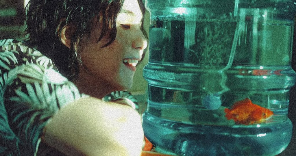 namnamjeans's tweet photo. i love the symbolism in this so much, the whole idiom “live in a fishbowl”, Here hes like laughing at himself he realizes the fish is living the same way he is. He cant escape being observed, so he sits observing himself https://t.co/2oDv7XU4Al