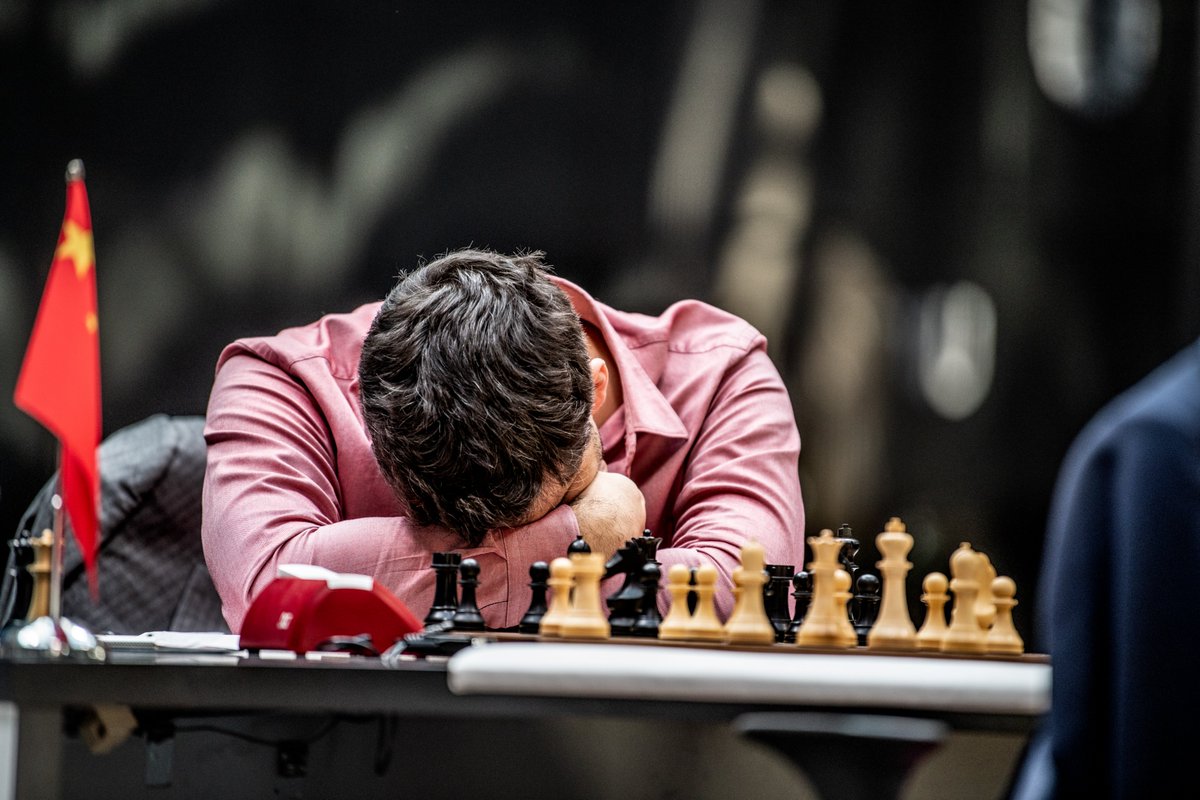 olimpiuurcan's tweet photo. Game eight of the world championship was another rich encounter with multiple twists and turns. Following a painful loss in the previous game, Ding Liren attempted to mount yet another comeback by allowing the Nimzo-Indian and making use of 9.Ra2!?, an unorthodox rook move that created a lot of excitement among several top-ten players after the game. Fabiano Caruana and Levon Aronian tweeted about it instantly, both "happy" to see it played in such a high-stakes game. Peter Svidler called it "a very rare" idea, and Caruana referred to it as "pure modern chess analysis based on modern engines." After the game, with a touch of Xiangqi speak, Ding himself called it a "cannonball in my preparation because it can be very powerful," as it was backed by deep computerized research in connection to 12.h4. Ian Nepomniachtchi's trouble started with 21…Nh4 and 22…Bxe4, a losing move. Ding's powerful 24.Rd2! put him on a very uncomfortable defensive. Daniil Dubov opined that the Russian's team should not have allowed Ding Liren to play such a dangerous line at this juncture in the match. It was too perilous indeed. Arguably the most important moment in the game was move 26: facing multiple attractive choices, some diabolically misleading, he settled for 26.d7, which maintained a chunk of his advantage but a win was not trivial. Instead, continuing the queen’s rook odyssey with 26.Rd3! Rd8 27.Rh3 would have netted him another remarkable comeback. A second critical moment was Nepomniachtchi's 31…Qh4, a move he called a "bluff," although he admitted he realized that Ding could escape a perpetual check only after he made the move. Considering that 31…Qf8 would surely lose, both Dubov and Svidler called it "by far the best chance even if it’s losing by force." Fearful of yet another damaging time-related crisis, Ding stopped his calculation halfway through and did not take the rook, thus missing a sensational king walk that would have won the day (32.Qxd8 Qe4+ 33.Re2 Qb1+ 34.Kd2 Qb2+ 35.Kd3 Qb1+ 36.Rc2 Qd1+ 37.Ke4 Qxc2+ 38.Bd3 Nd6+ 39.Ke5). By comparison, 26.Rd3 was infinitely easier to find and calculate. Finally, with his advantage significantly dwindled, Ding's 37.Bf3? was an error that allowed Nepomniachtchi to escape with 37…Nxf2!! and save the day. Vishy Anand, who referred to the the game as "a titanic struggle," concluded: "Ding deserved more for his courage, but Nepomniachtchi defended brilliantly when he needed to. Nerves are a significant factor. This match is for the ages." In regard to White's creative rook play in this game, Dubov referenced the first game of the 1960 world chess championship between Tal and Botvinnik. It broke down some stereotyped thinking about king safety and traditional rook play. That classic game is worth replaying on a rest day (FIDE/David Llada).