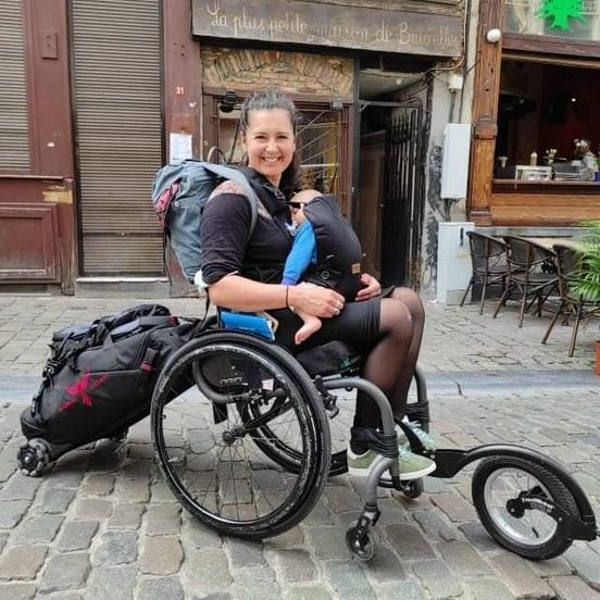_PhoenixI's tweet photo. We all know Mums are multitasking Queens 👑

Sara shows us just how much of one she is!!

Sara has the All in One Twinset attached to the back of her @AriaWheels chair.

Buy the Twinset now at https://t.co/DWS9sqXRwD 
#DisabilityTwitter https://t.co/MOjLCTuiOX