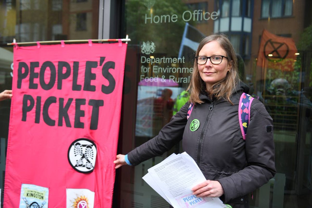 XRebellionUK's tweet photo. #TheBigOne started at 7am, with People’s Pickets at every major gov department in Whitehall. People are calling for urgent new policies to deal with issues including the cost of living crisis, failure to insulate homes, &amp; failure to protect vulnerable migrants seeking safety here https://t.co/IZOJDUlVut