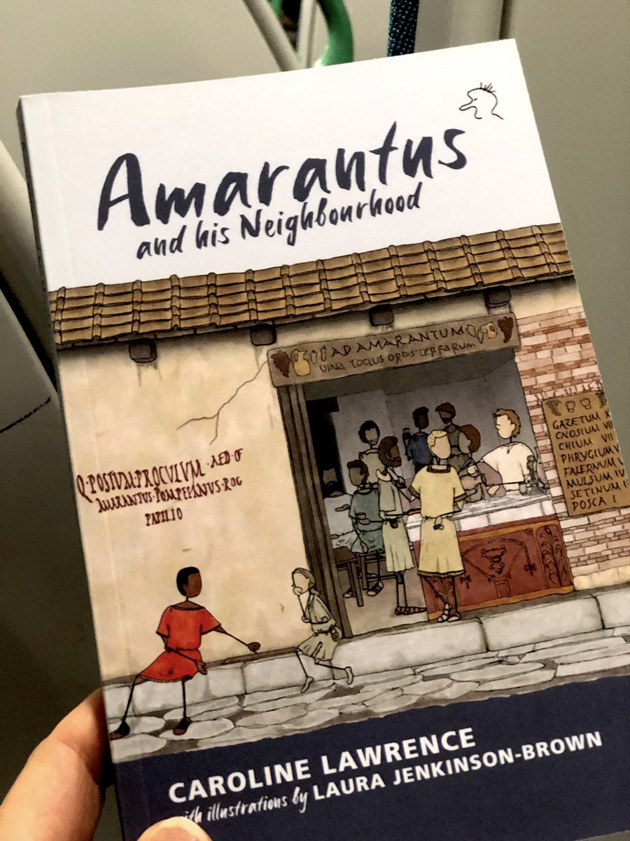 CarolineLawrenc's tweet photo. Rereading #Amarantus on the train to #CA2023 because my memory is so bad. 🤪 If you know me and I walk right by you in Cambridge this weekend please say ‘It’s me [your name]…’ I promise I’m not blanking you! 😅 https://t.co/cCiJf8DsOd