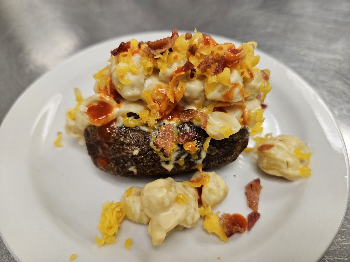 coach_jacobson's tweet photo. We had some extra russet potatoes, so for lab on Wednesday, Culinary 2 made some Loaded Mac and Cheese Stuffed Potatoes! This was a first time recipe and was a big winner! 😋 @wilmotuhs #InspiredByWilmot #stuffedpotato #macandcheesepotato https://t.co/crSy4EKS3p