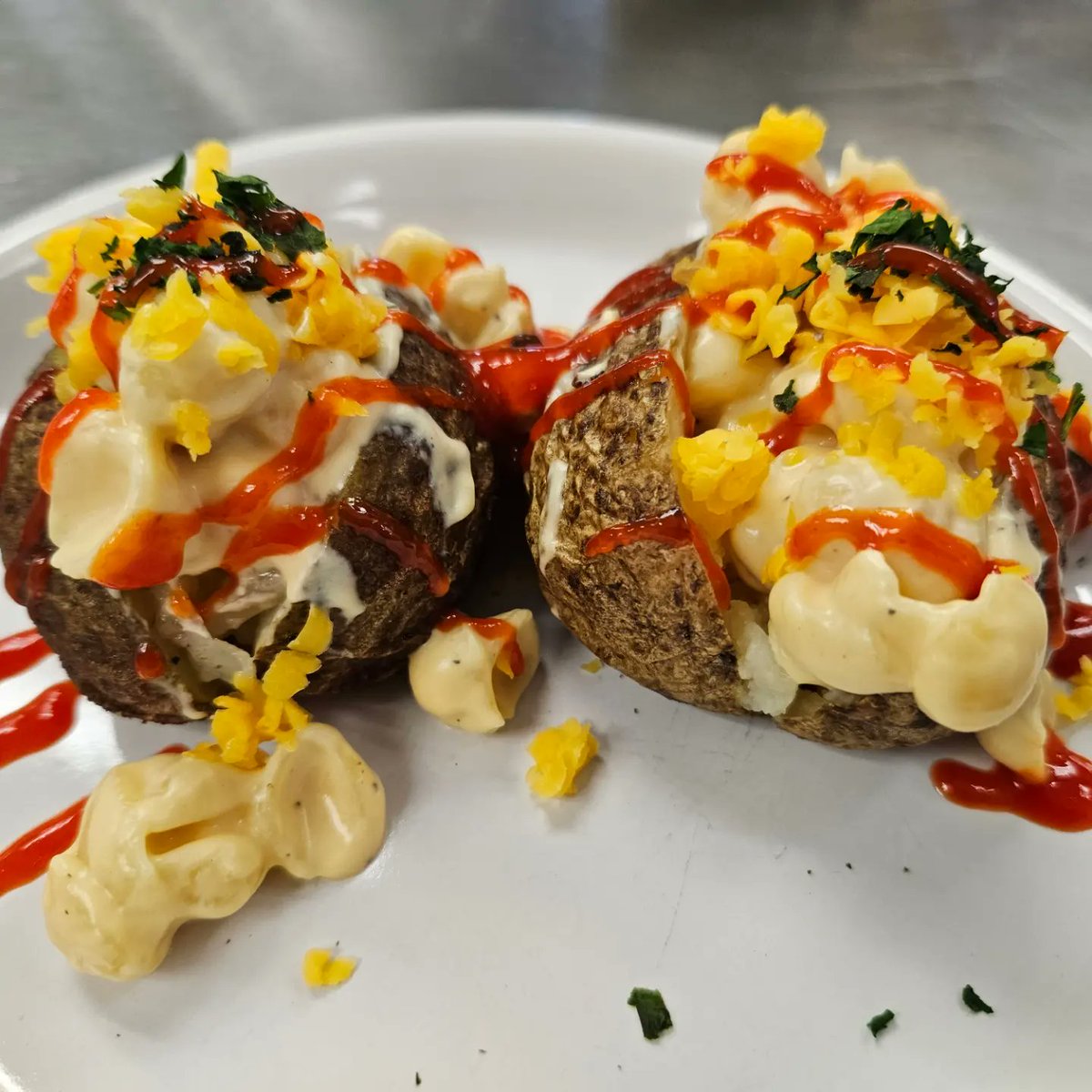 coach_jacobson's tweet photo. We had some extra russet potatoes, so for lab on Wednesday, Culinary 2 made some Loaded Mac and Cheese Stuffed Potatoes! This was a first time recipe and was a big winner! 😋 @wilmotuhs #InspiredByWilmot #stuffedpotato #macandcheesepotato https://t.co/crSy4EKS3p