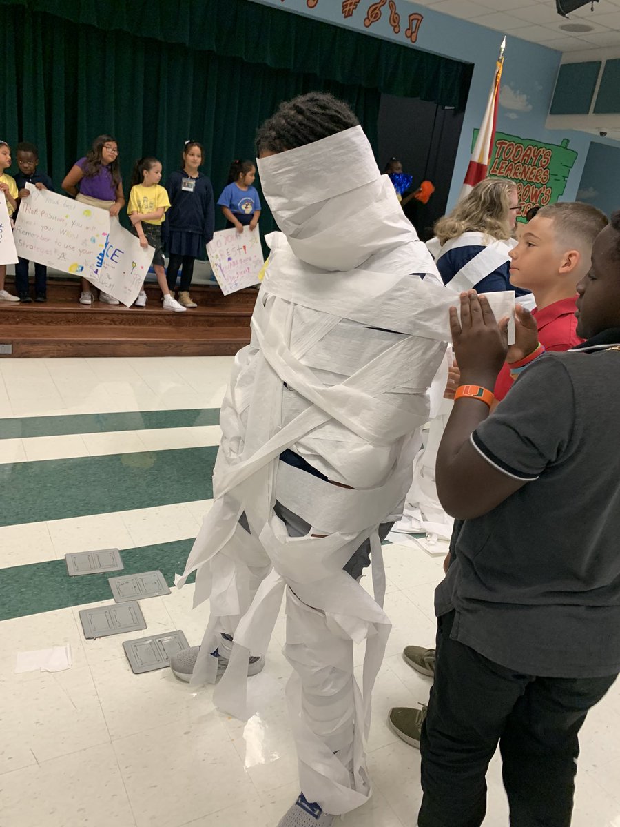 Mrs_Eble's tweet photo. Our @hceotters Mini-Lighthouse did an amazing job putting on our second State Testing Pep Rally! Shout out to 3rd grade and @MissHayesHCE for winning the toilet paper mummy game! Also shout out to @IvetteFkinder for being a great Co-facilitator. https://t.co/1vNClw223W