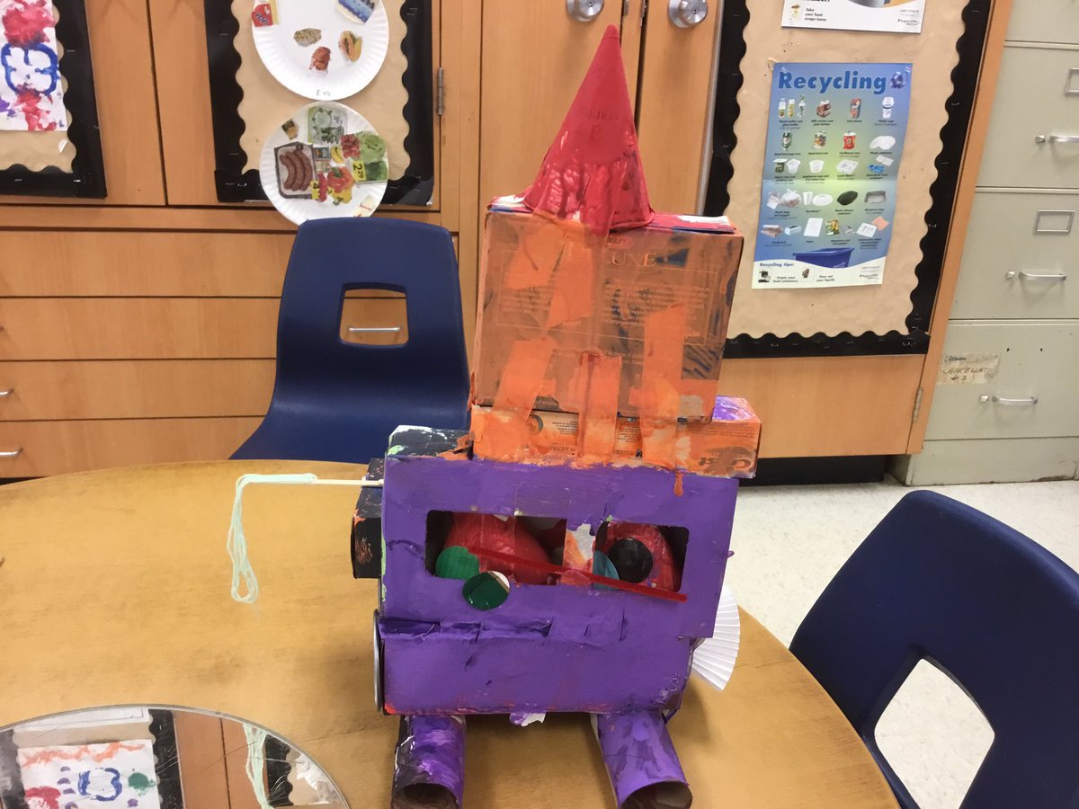 3D Build Final Product -  “I made a fire truck.  I got a ladder to get up to the top.  If there is a cat to get in a tree, I use the ladder.  I got a red light and it makes a loud woowoo sound.  I got a water to get the fire gone.” said E.T.
