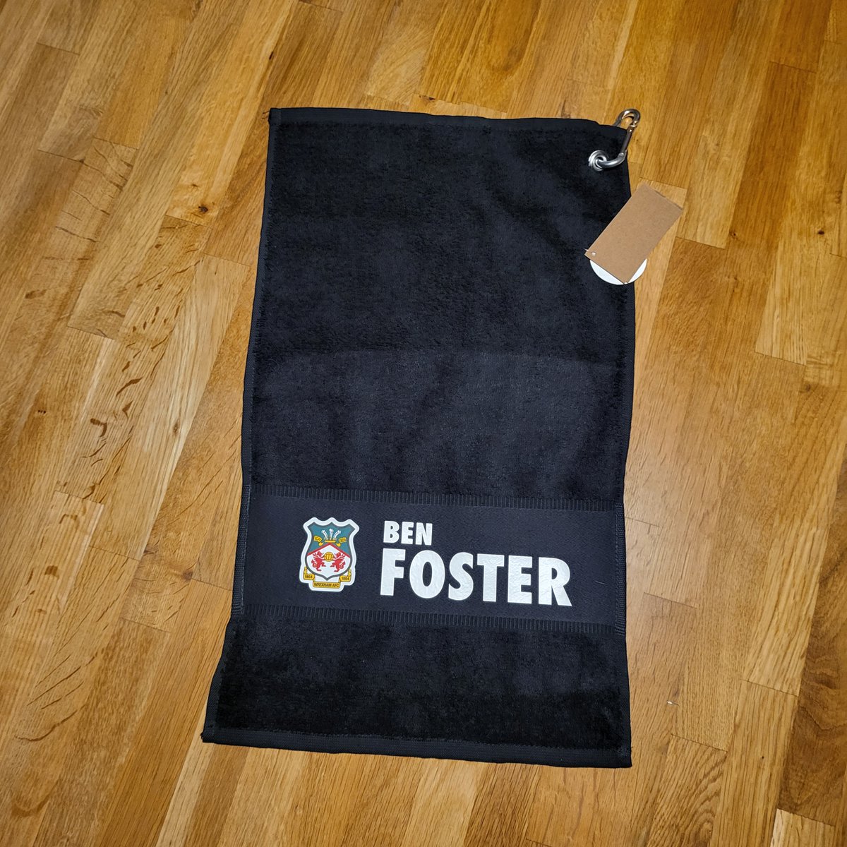 HusonDesign's tweet photo. @Wrexham_AFC @BobbyMooreFund Not a shirt, but we have a towel......

In celebration of the incredible penalty save vs @Official_NCFC, we have made this gift for
@BenFoster of @Wrexham_AFC

Help us get this gift to Ben!! A custom goalkeeper towel!

@VancityReynolds can you help?  

#football #wrexhamfc https://t.co/G42Ts9U21P