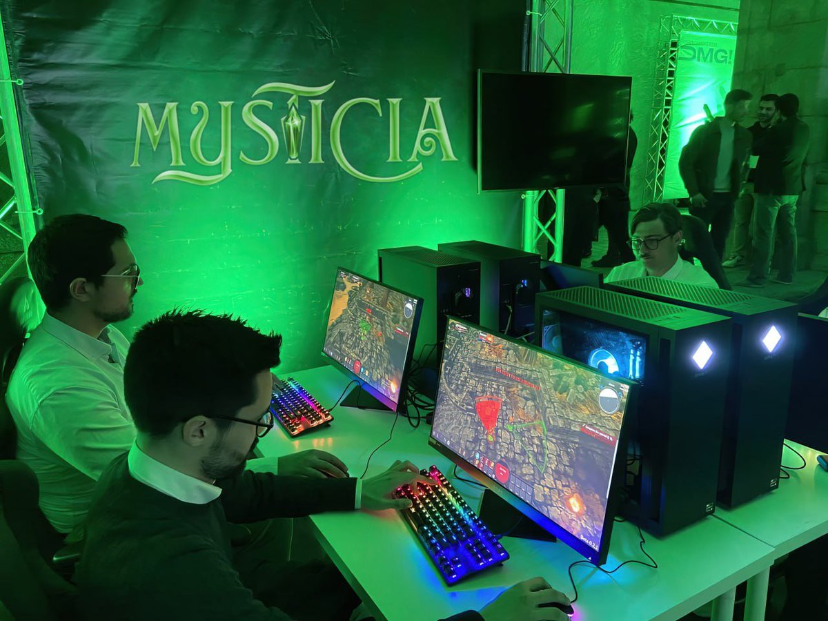 🎮 We had an amazing time showcasing Mysticia at the recent OMG conference! Attached is a photo of our developers playing side-by-side with our players, battling dangerous monsters within the game.