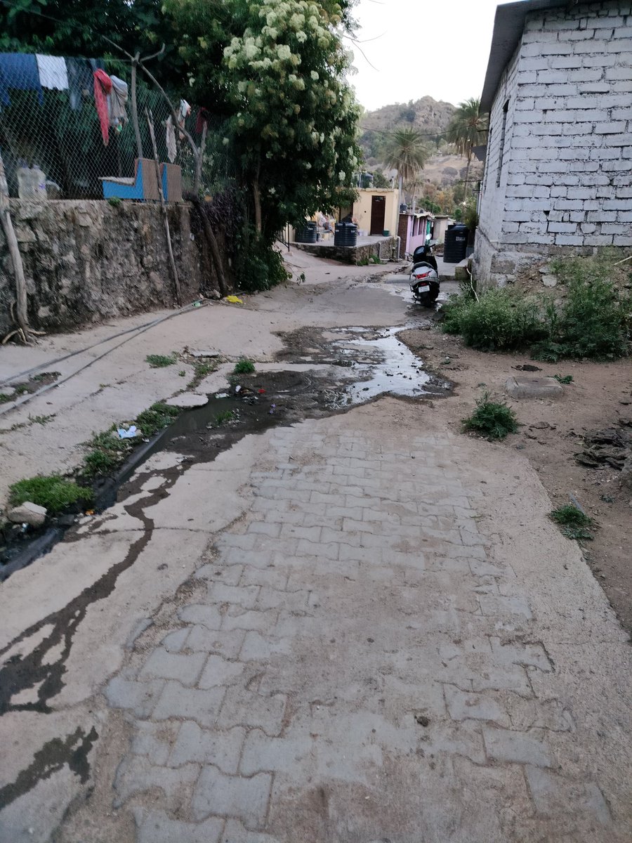 2004_Sahil_'s tweet photo. This is the street of our colony on which the gutter and sewage waste is flowing over . It has been happening for almost a year and it gets worse during monsoon.I'll request responsible authorities take action ASAP. 
Address - BEHIND HOTEL SHIKHAR, AMBEDKAR COLONY, MOUNT ABU,RAJ. https://t.co/hdAskgUuHr
