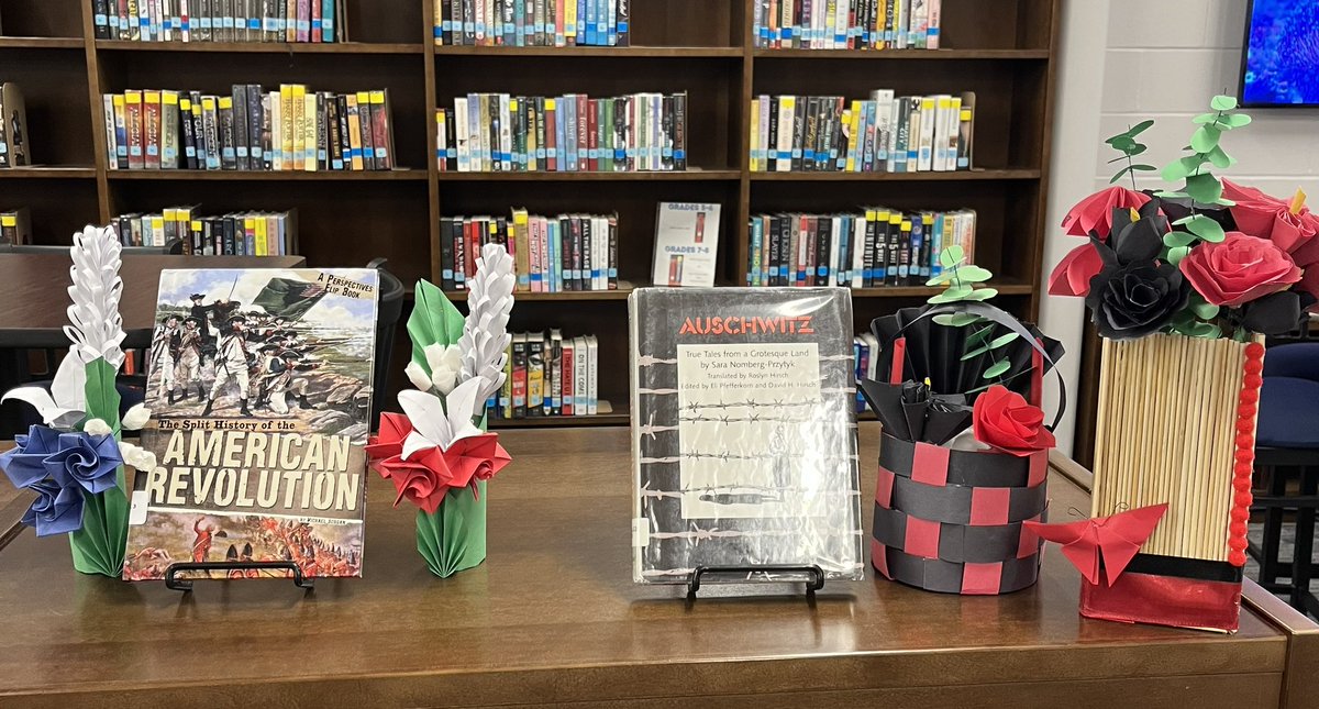 WVReads's tweet photo. Spring has sprung in the LMC! Love these paper flower creations by the Floral Design class ❤️🌸📘 https://t.co/eVASXtBZL2