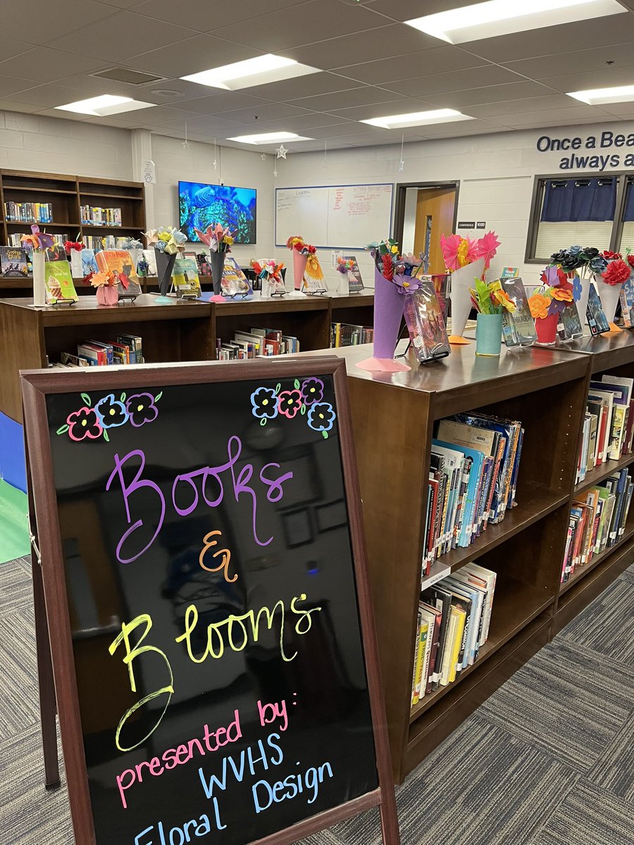 WVReads's tweet photo. Spring has sprung in the LMC! Love these paper flower creations by the Floral Design class ❤️🌸📘 https://t.co/eVASXtBZL2