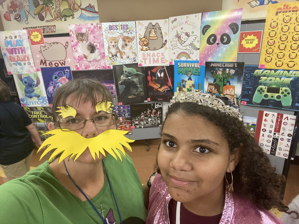QueenBostic7's tweet photo. The Lorax showed up to the book fair today! 
  Lorax speaks for the trees but agrees these books were worth the paper they are printed on!
  Hope to see you next week Monday and Thursday for family night and all week during the day! @lcmediatbk8 @PTSATBK8 @TurnerBartelsK8 https://t.co/1yxAUVbG8T
