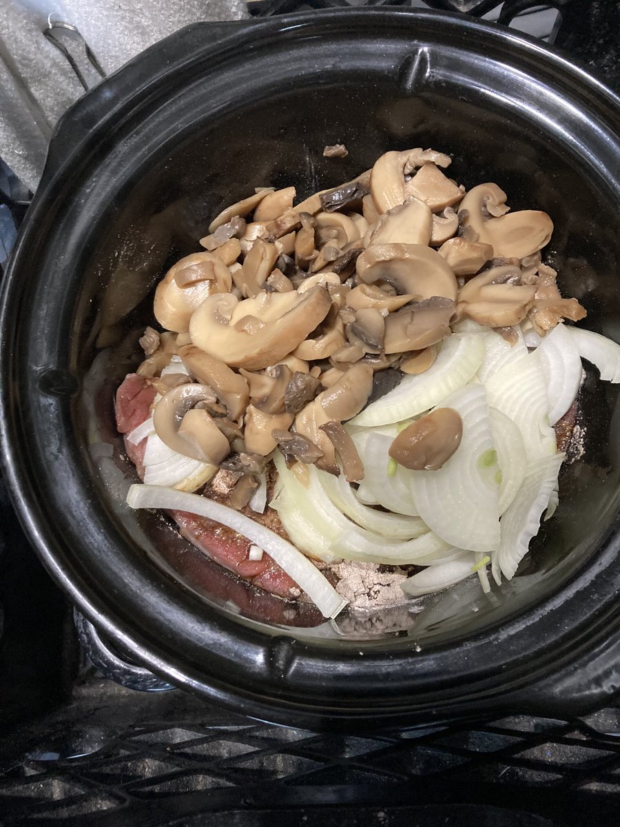 ExplodingPossum's tweet photo. 😆 So easy a driver can do it 
Roughly a 2 pound London broil (found on a use today clearance)
Cut up onion
Packet of au jus
Can of drained mushrooms 
This is a 3Qt crockpot in my truck crate 🙃 https://t.co/zqtP3eBn0O