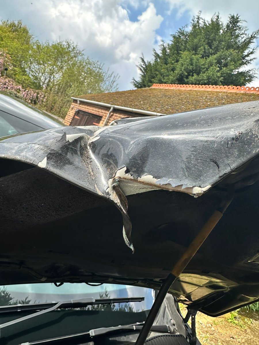 KLashmar's tweet photo. @Cambs_Traffic @A47info On this stretch at around 9:30 this morning, a car wheel flew at my car causing this damage. Does anyone have dash cam footage of the vehicle it came from? https://t.co/9h2F0LDCXz
