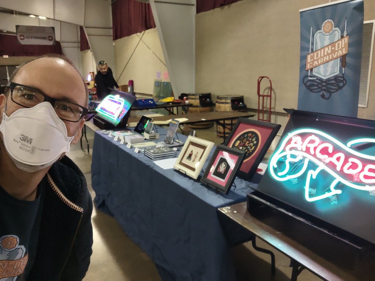 coinopcarnival's tweet photo. Comics, neon, cross-stitch, pinball! You want it, I've got it at Pinball at the Zoo in Kalamazoo, MI, today and tomorrow (April 21-22). First show I've exhibited my neon designs, first time exhibiting since 2019. See you out here, say hello, and play a ton of pinball!!! https://t.co/uPNuuPWBFj
