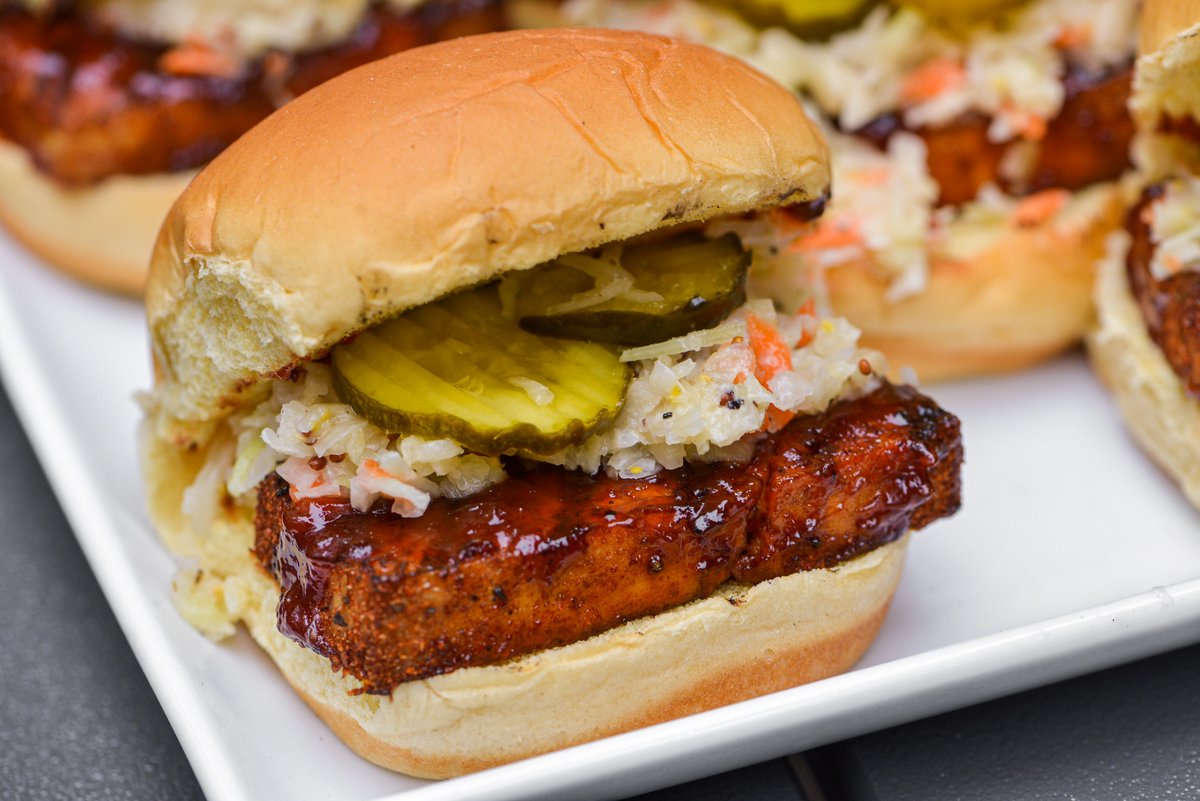 I found a sweet maple barbecue sauce I originally made for ribs worked even better in these tofu sandwiches when paired up with a mustardy slaw and bread and butter pickles: bit.ly/3AhIxeb