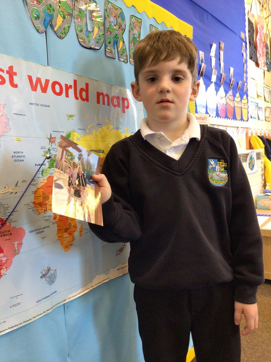 ypd_aidancampus's tweet photo. We all talked about the different places we have been on holiday and how we got there. Then we used our special photo or picture and string to  Show where we went on the world map! #SizzlingSummer 😎🍦☀️ 
#teamypdva🖤💛 @Penrhyndewi https://t.co/qLh88TgibH